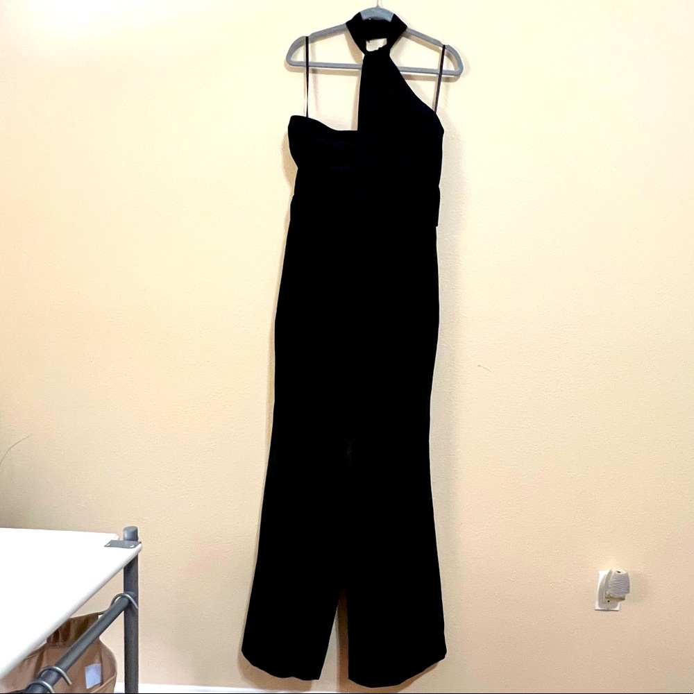 BEBE jumpsuit. Brand New with Tags. Size 14. Super Elegant 🌹